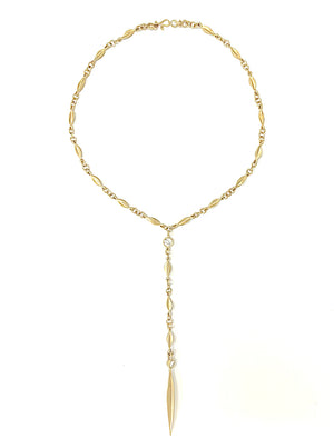 Seed like link chain necklace with large diamonds ending with a long pointy drop.
