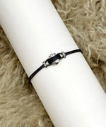 Cord bracelet with horn and sterling silver elements