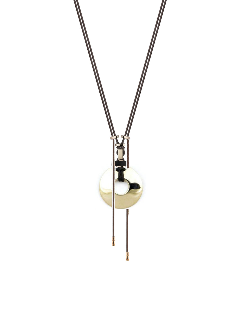 Stylish sterling silver disc pendant with unique horn detail, suspended on a long, durable parachute cord—perfect for everyday edgy elegance.