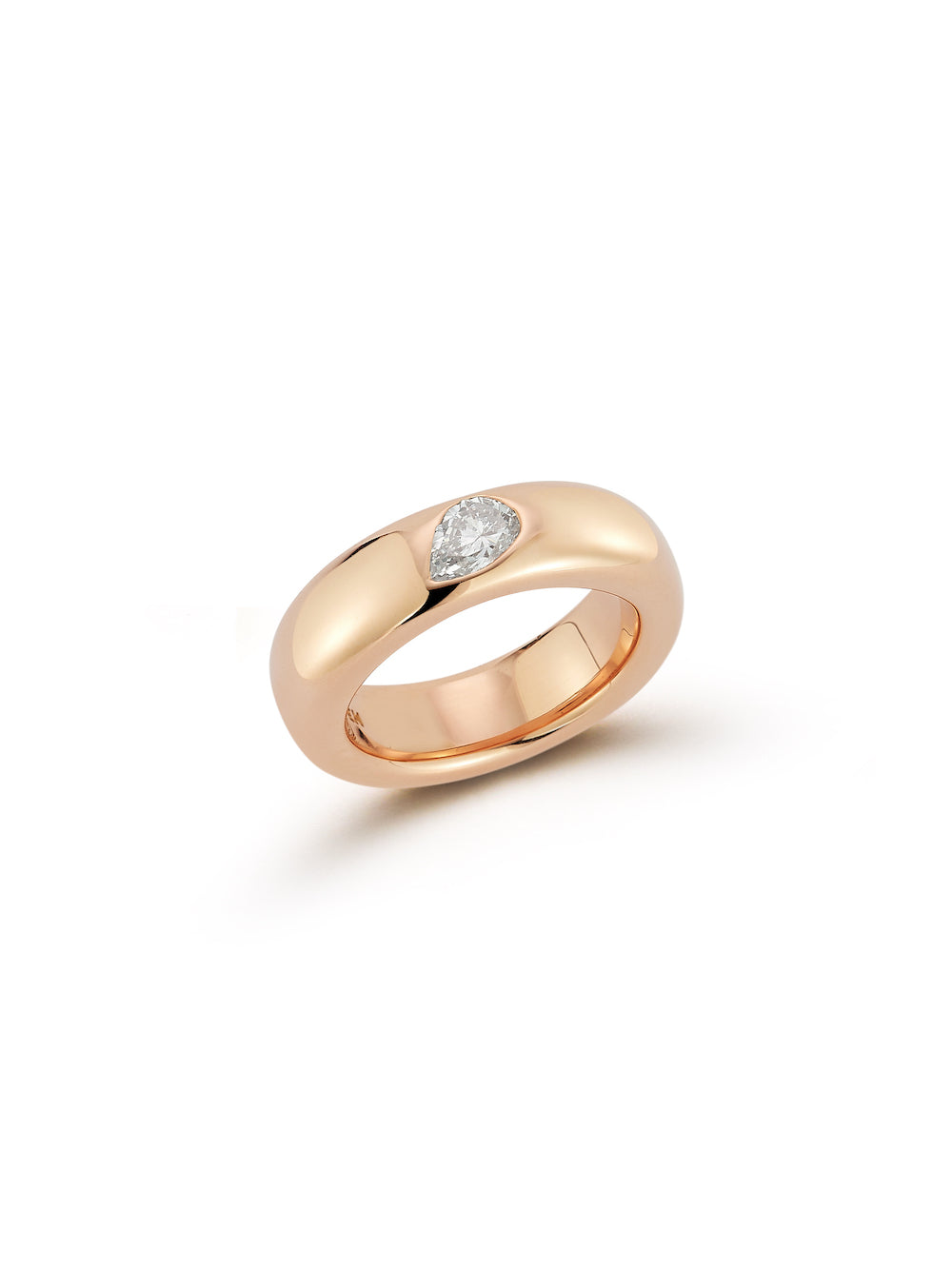 The Joia ring is designed for the pinky, crafted in solid 18k yellow or rose gold and set with a .35ct pear-shaped mined diamond. 