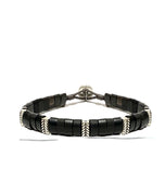 Rugged men’s bracelet with sterling silver and buffalo horn links. 
