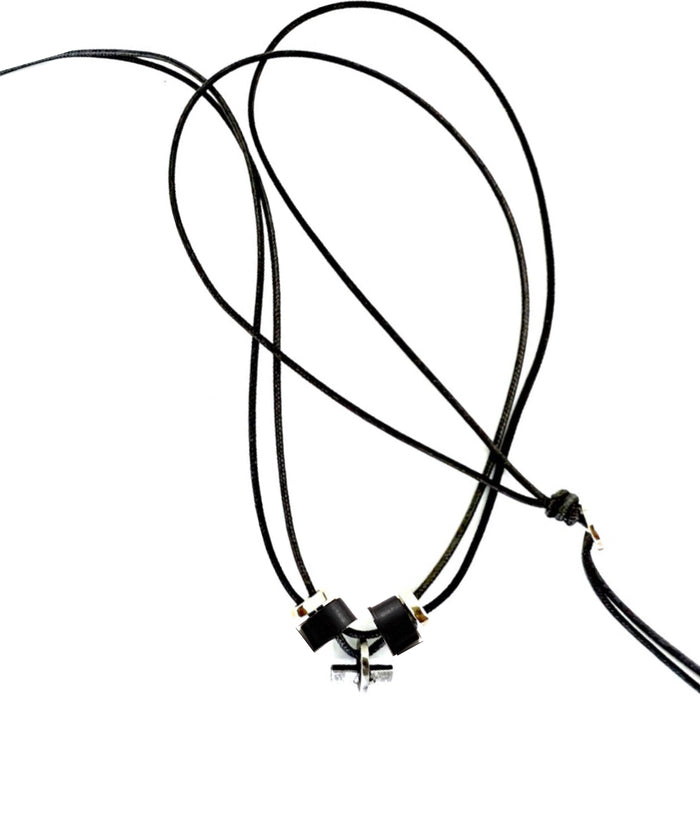 A black and silver necklace with a sterling silver horizontal bar design, featuring two gold bars on each side.