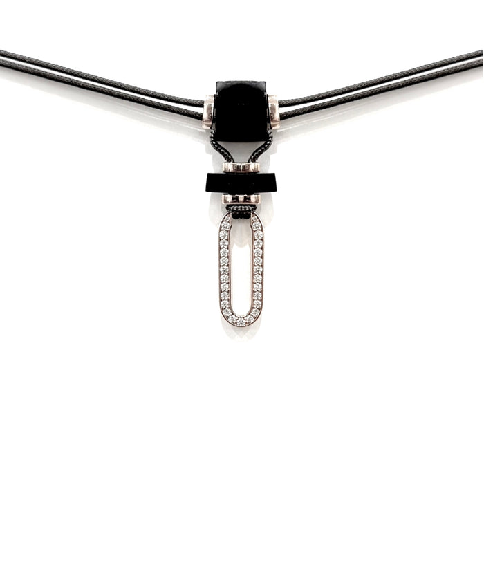  Niru Horn necklace in 18k white gold — oblong pavé diamond pendant suspended from hand-cut horn on grey parachute cord, white background