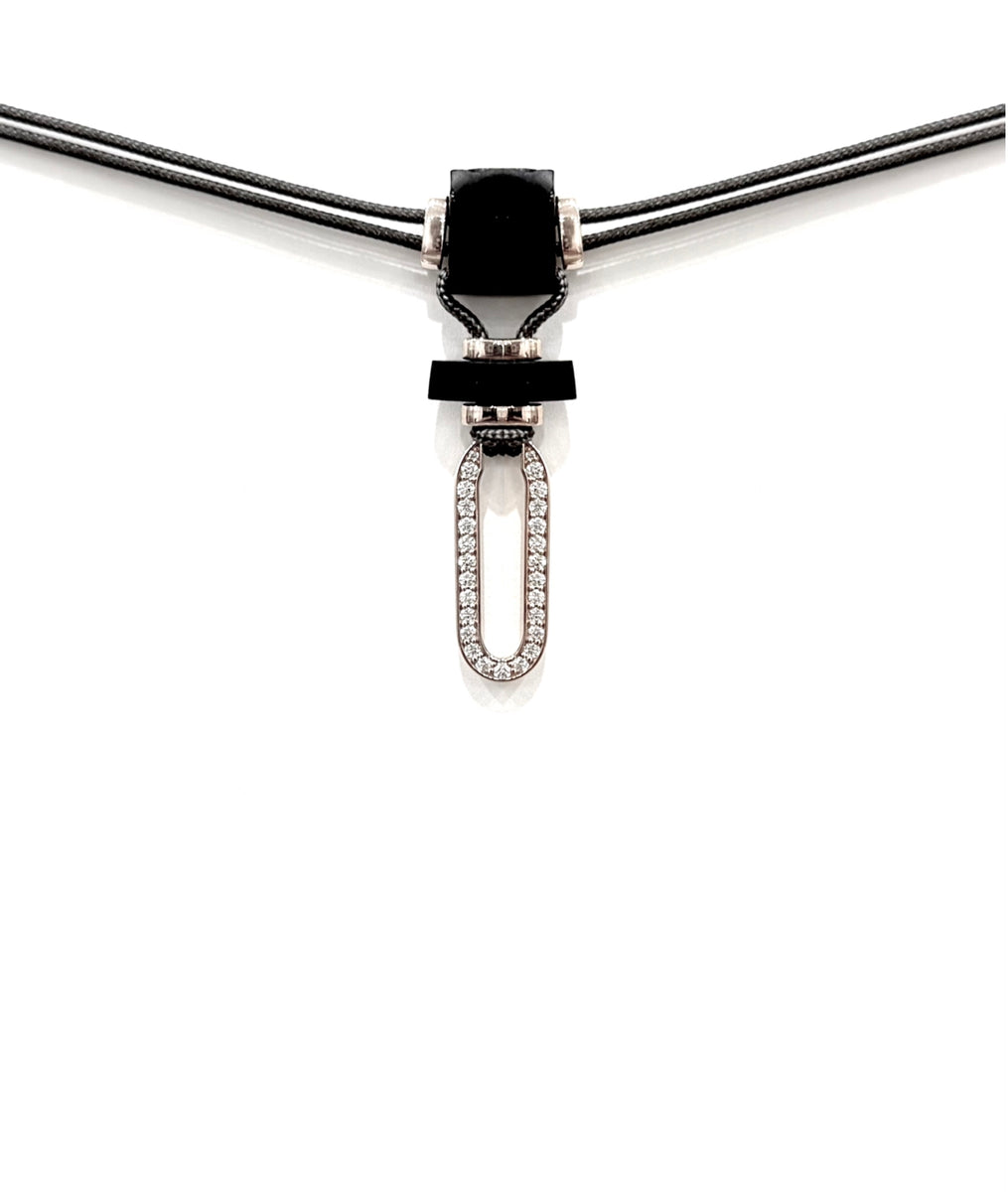  Niru Horn necklace in 18k white gold — oblong pavé diamond pendant suspended from hand-cut horn on grey parachute cord, white background