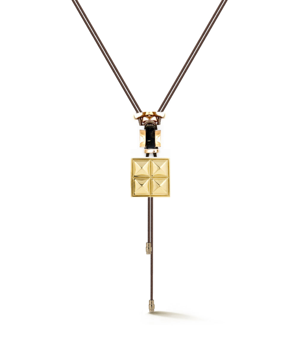Necklace with 4 pyramids in 18K yellow gold draped on parachute cord