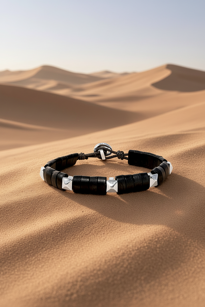 Capri Horn Sterling Silver bracelet on desert sand