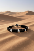 Capri Horn Sterling Silver bracelet on desert sand