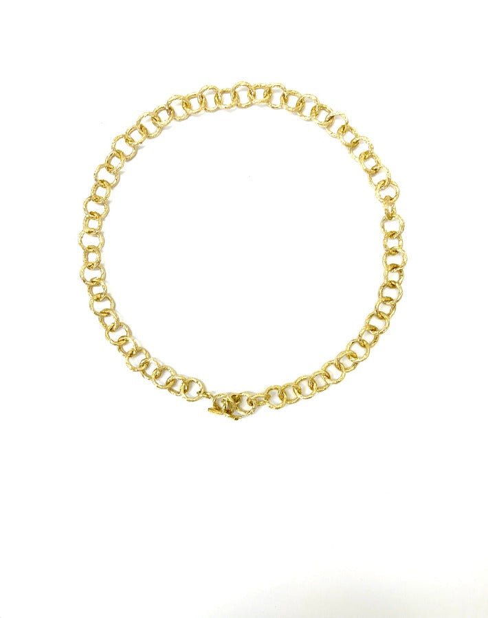 Necklace made of textured links 17" long in 18k solid gold.