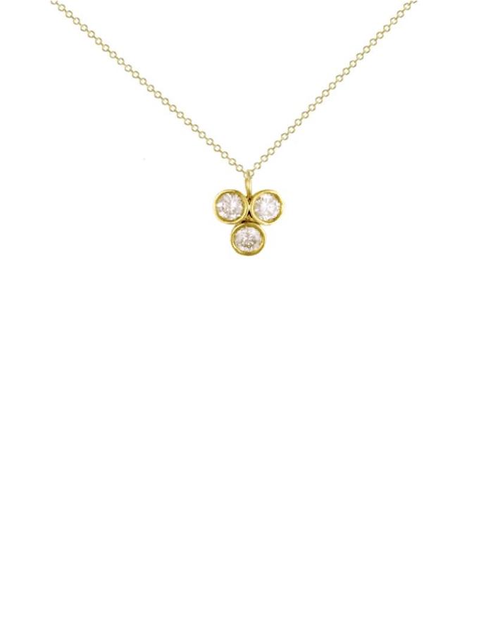 The Clover necklace features three round brilliant diamonds, totaling 0.75ct, elegantly set on a delicate 18kt gold chain.