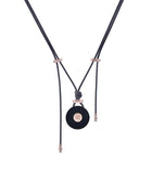 How we love Ines ! Our signature buffalo horn is hand-carved and encrusted with an 18kt rose gold screw and draped on parachute cord for an effortless look.  Wear the Ines with jeans or your best little black dress, it is super chic and cool... Waterproof, you can wear in the shower, pool or ocean. Hand made in our New York studio with love. Please note: The horn comes from Asian Water Buffalo sustainably farm raised for consumption. 