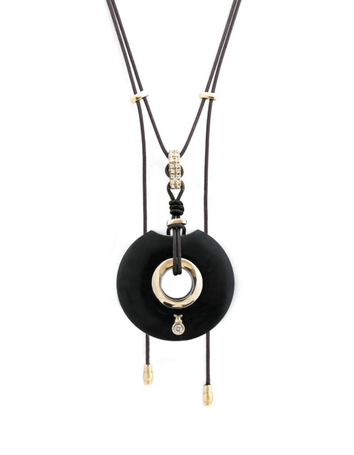Discover our handcrafted Morado wood pendant necklace with a 0.10ct diamond and 18kt white gold accents, suspended on durable parachute cord—luxury meets modern design.